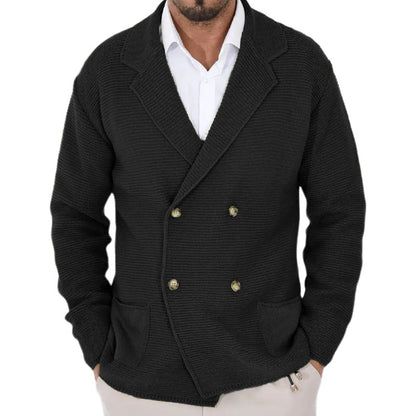 Black double-breasted blazer worn by a person on a white background