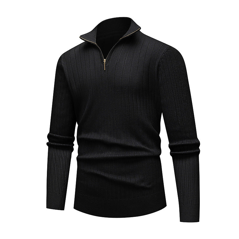 Black long-sleeve shirt with a zipper on a white background