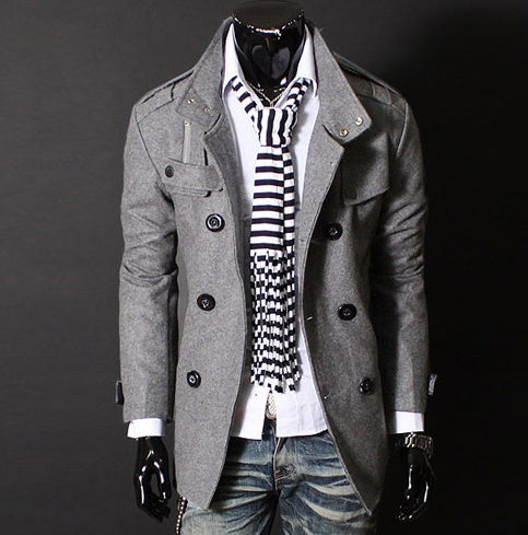 Gray peacoat with striped scarf on a dark background