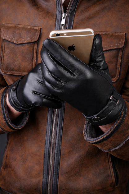 Man wearing black leather gloves