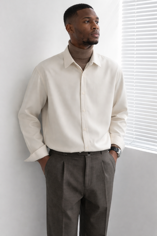 Man wearing a beige long sleeve shirt