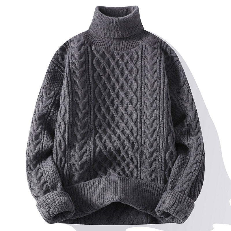 Gray cable knit sweater on a white background