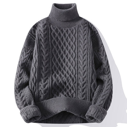 Gray cable knit sweater on a white background