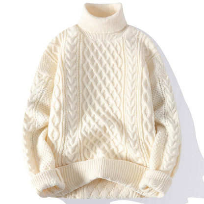 Cream-colored cable knit sweater on a white background